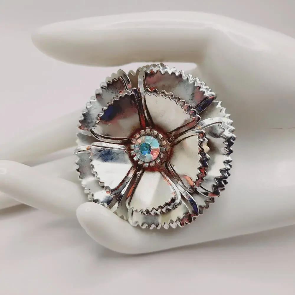 Vintage Silver Tone Flower Brooch with AB Rhinestone Center Reflective Floral